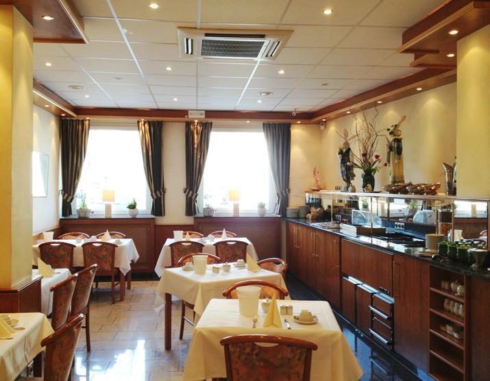 Hotel Ilbertz Garni كولونيا المطعم الصورة